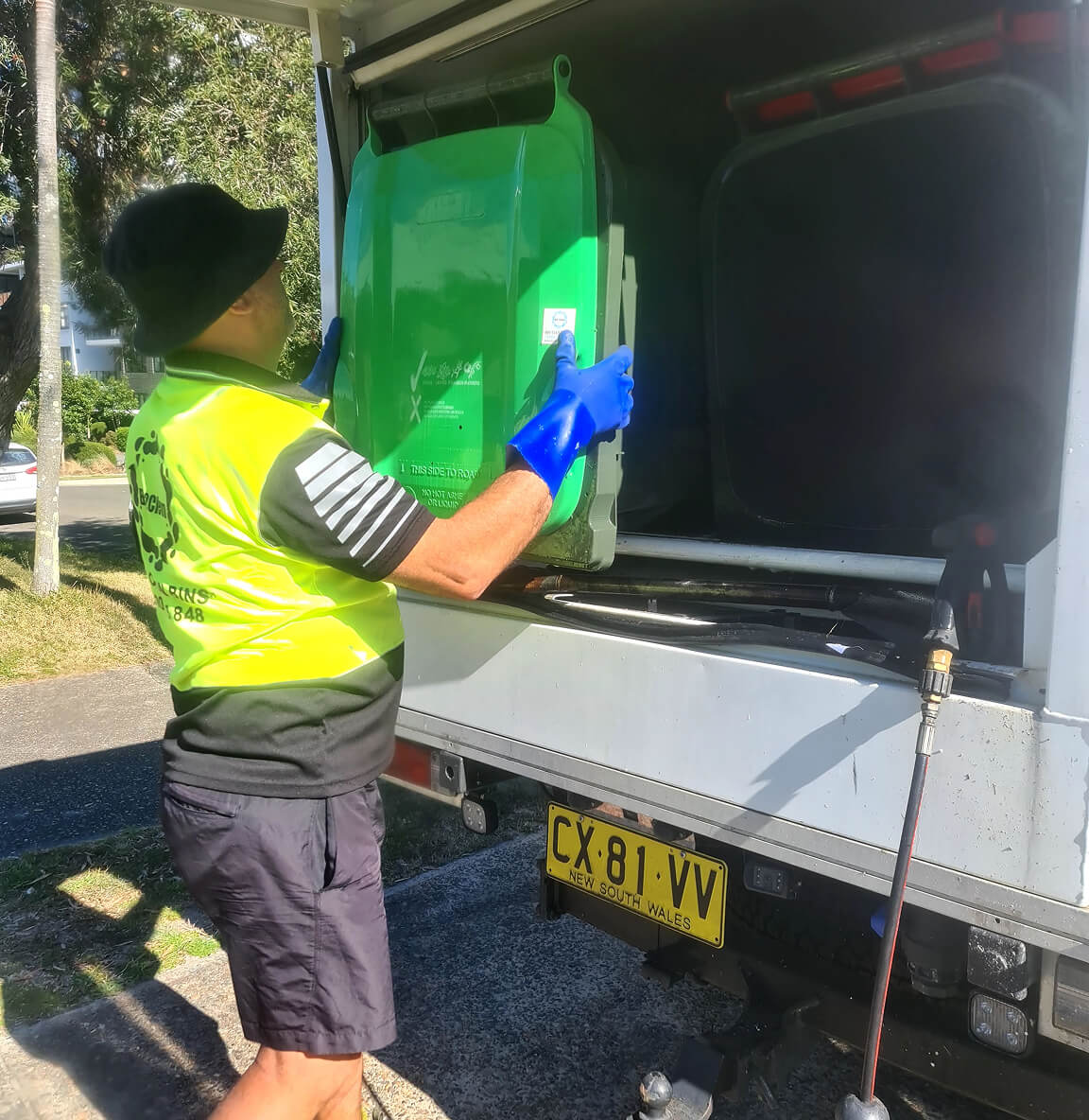 Bin2Clean team providing professional wheelie bin cleaning services